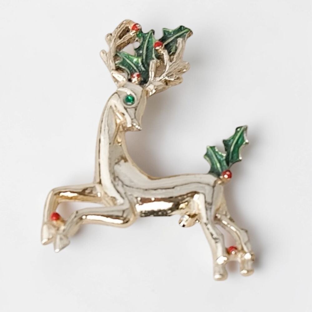 Vintage Gerrys Reindeer Christmas Brooch Pin Gold Tone Green Rhinestone Eye